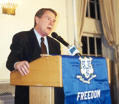 Color Picuture of Jim Lehrer speaking at the 25th Anniversary Celebration